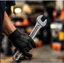 Mechanic holding a wrench